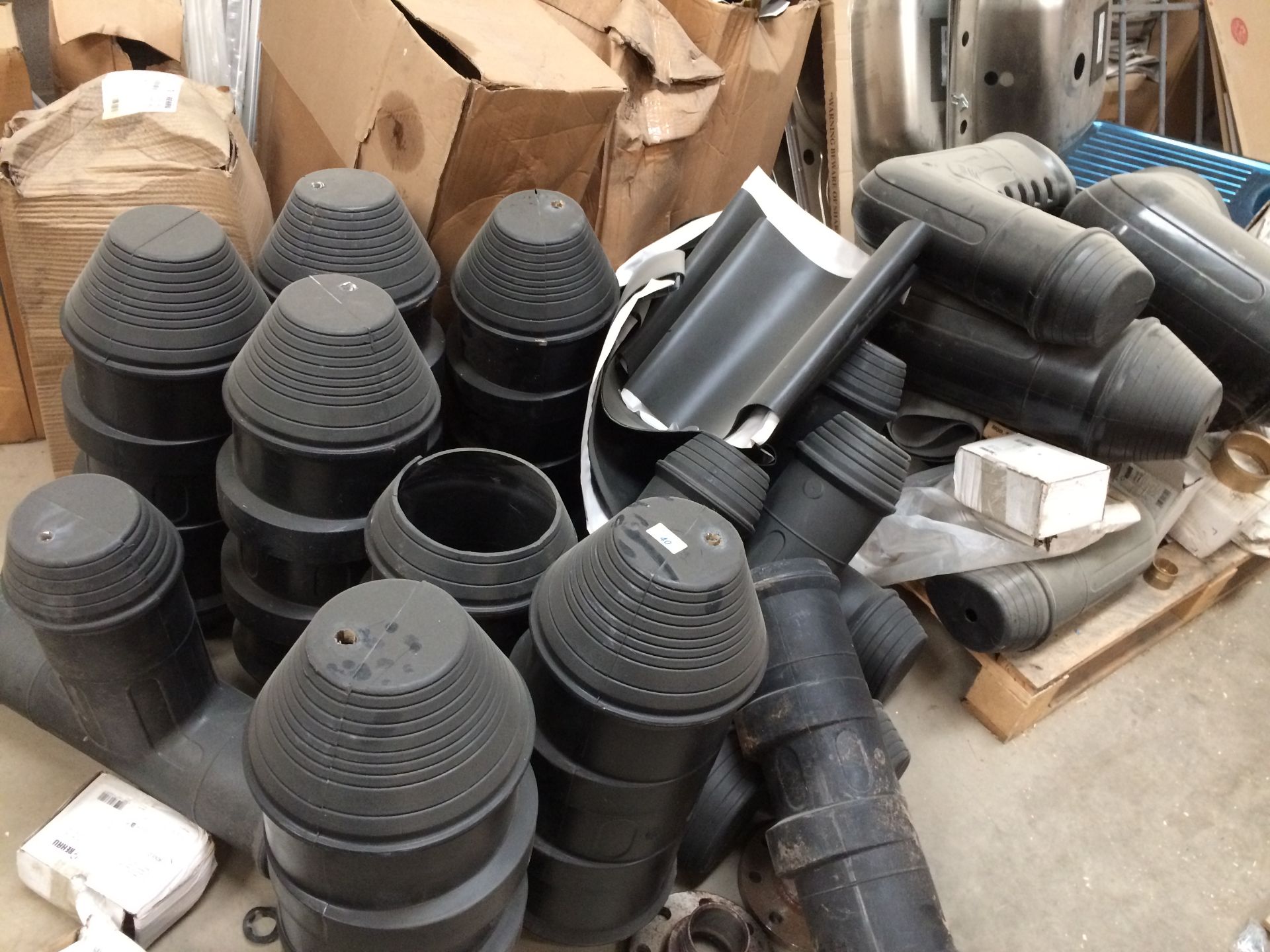 Contents to pallet large plastic elbows,