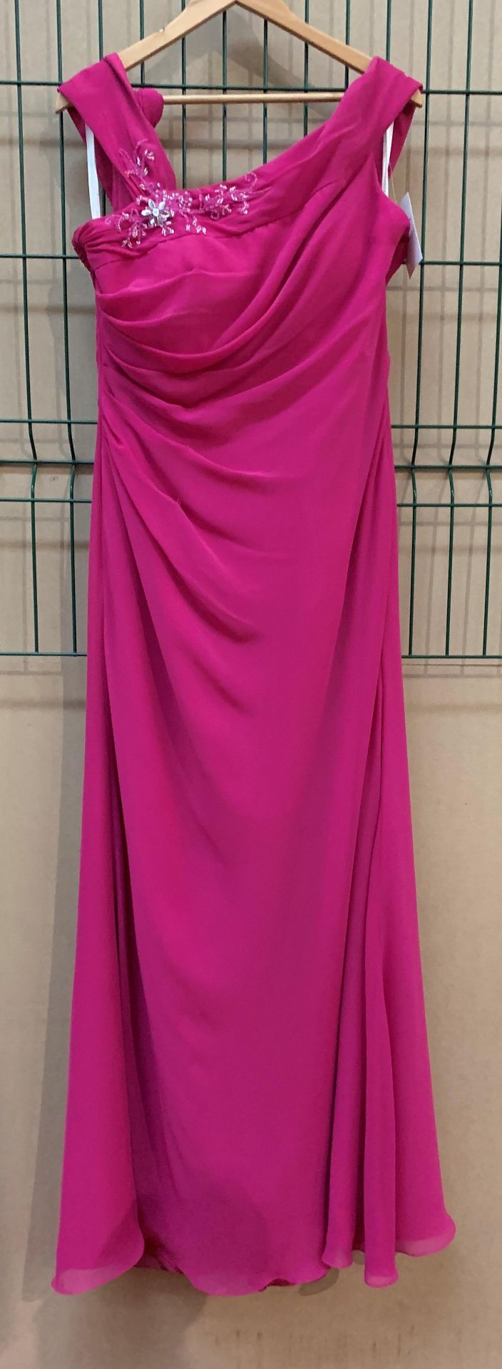 A bridesmaid/prom dress by Forever Yours, style 8902, rasberry/silver, size 16,