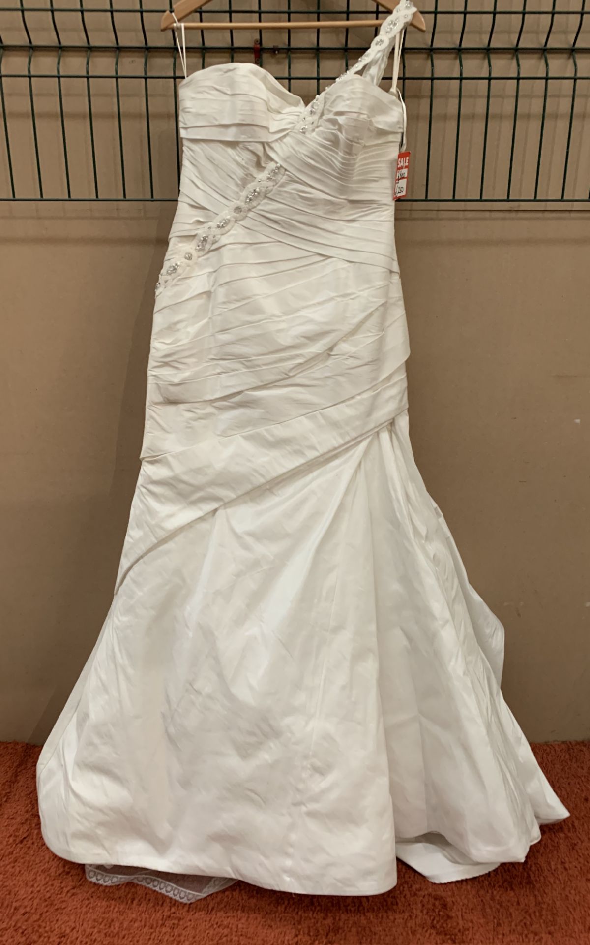 A wedding dress by San Patrick, ivory, size 16,