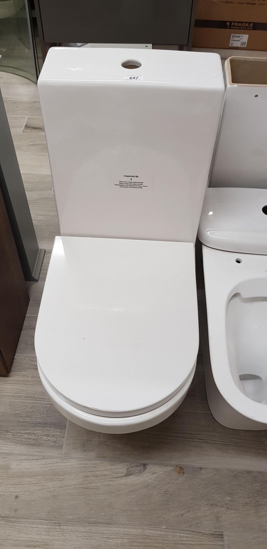 Toilet pan and single piece cistern with seat