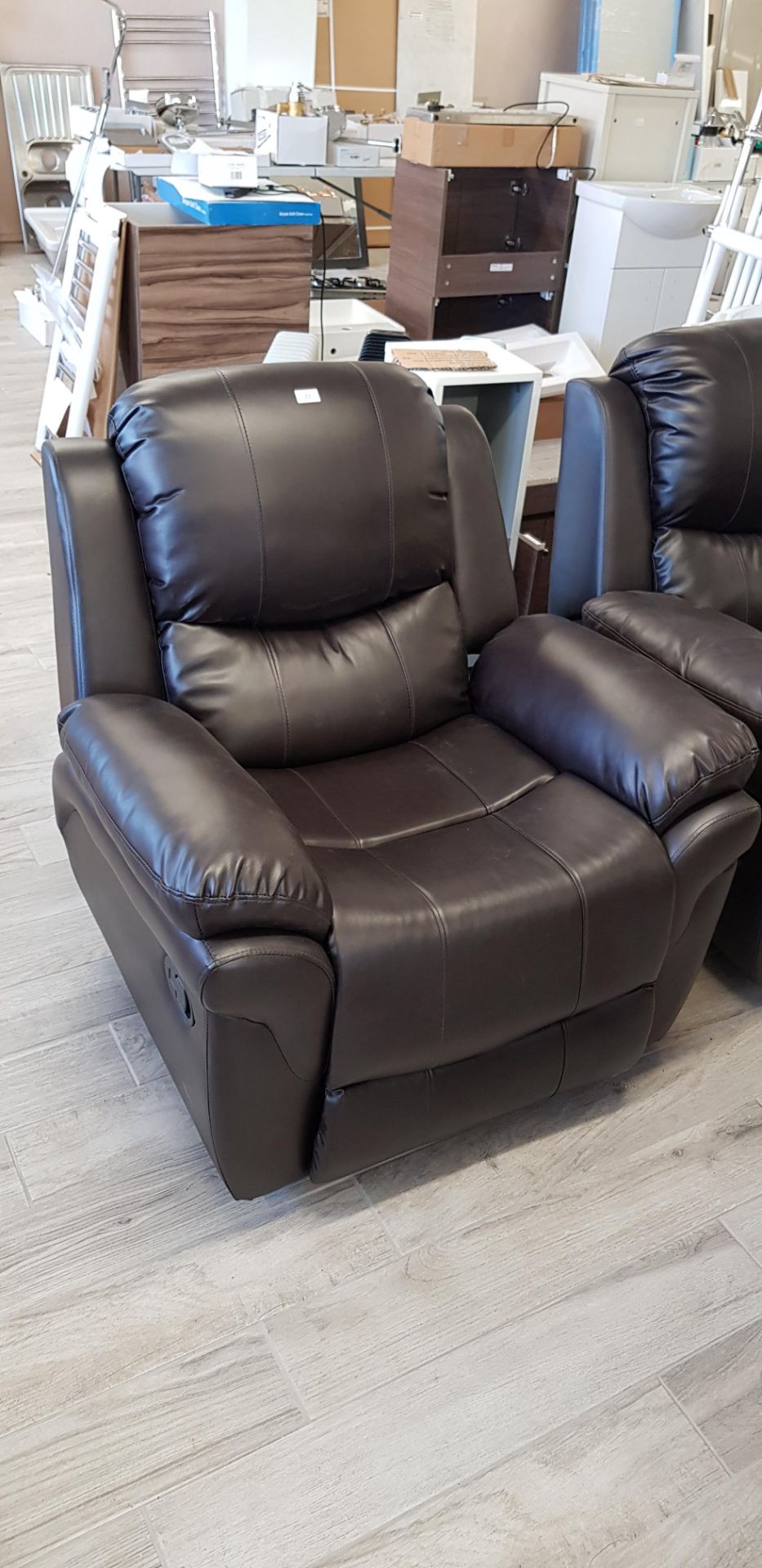 Brown side operated manual recliner chair