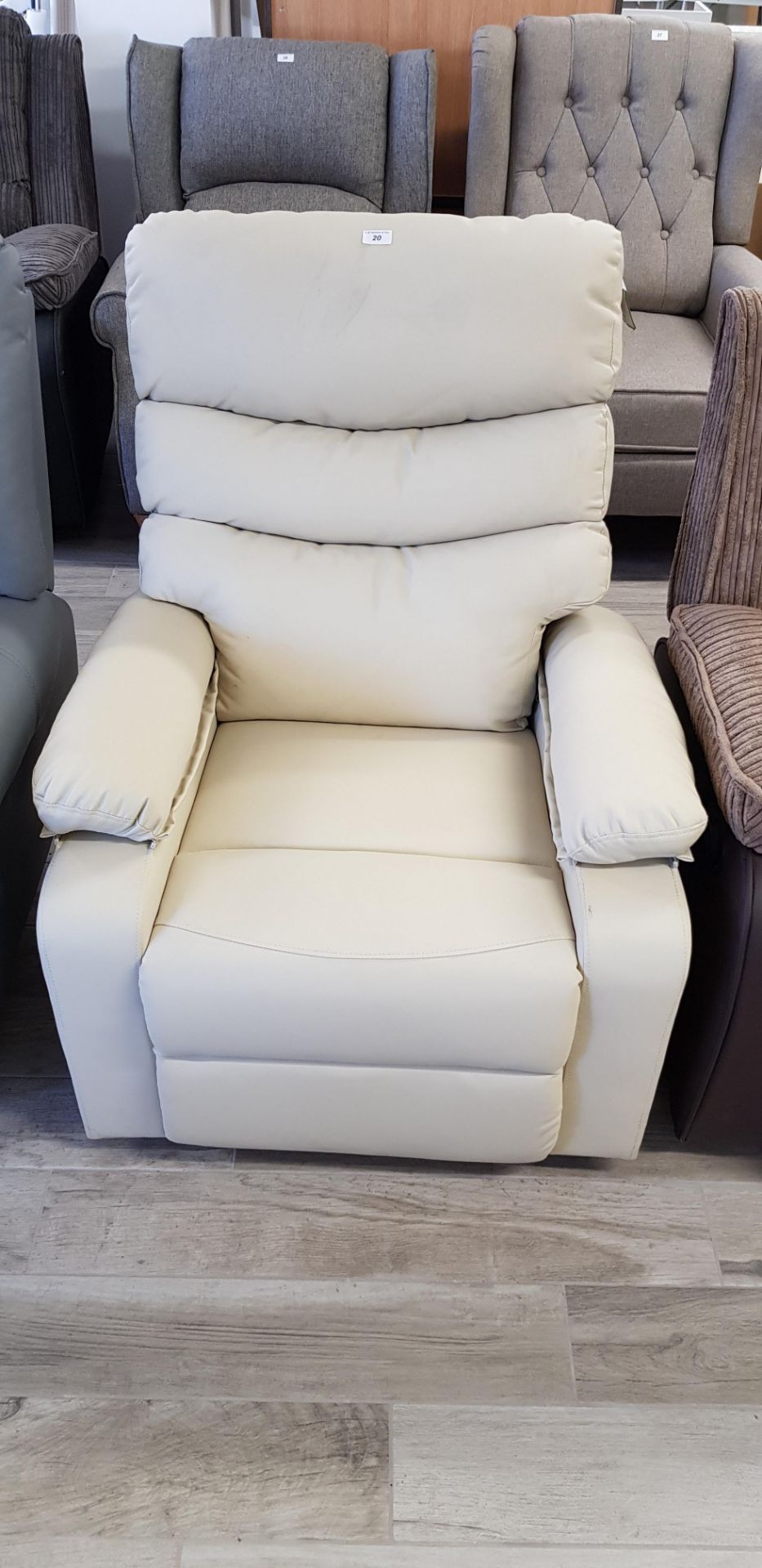 Cream side operated manual recliner chair