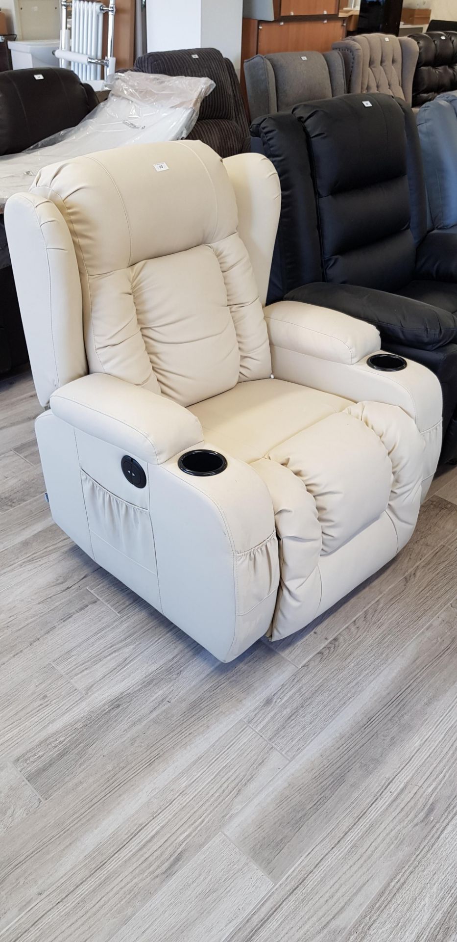 Cream side operated electric recliner chair with 2 x cup holders