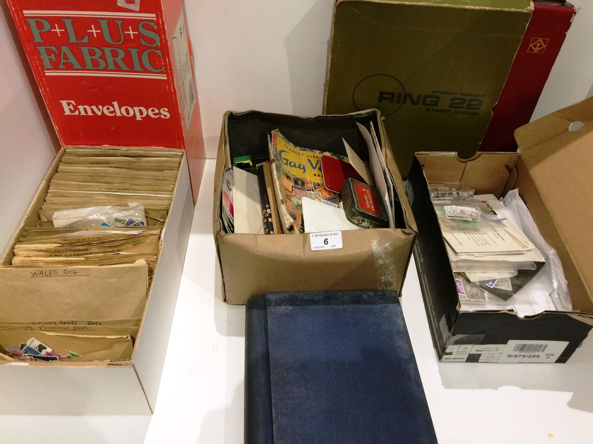 Three boxes of loose world stamps,