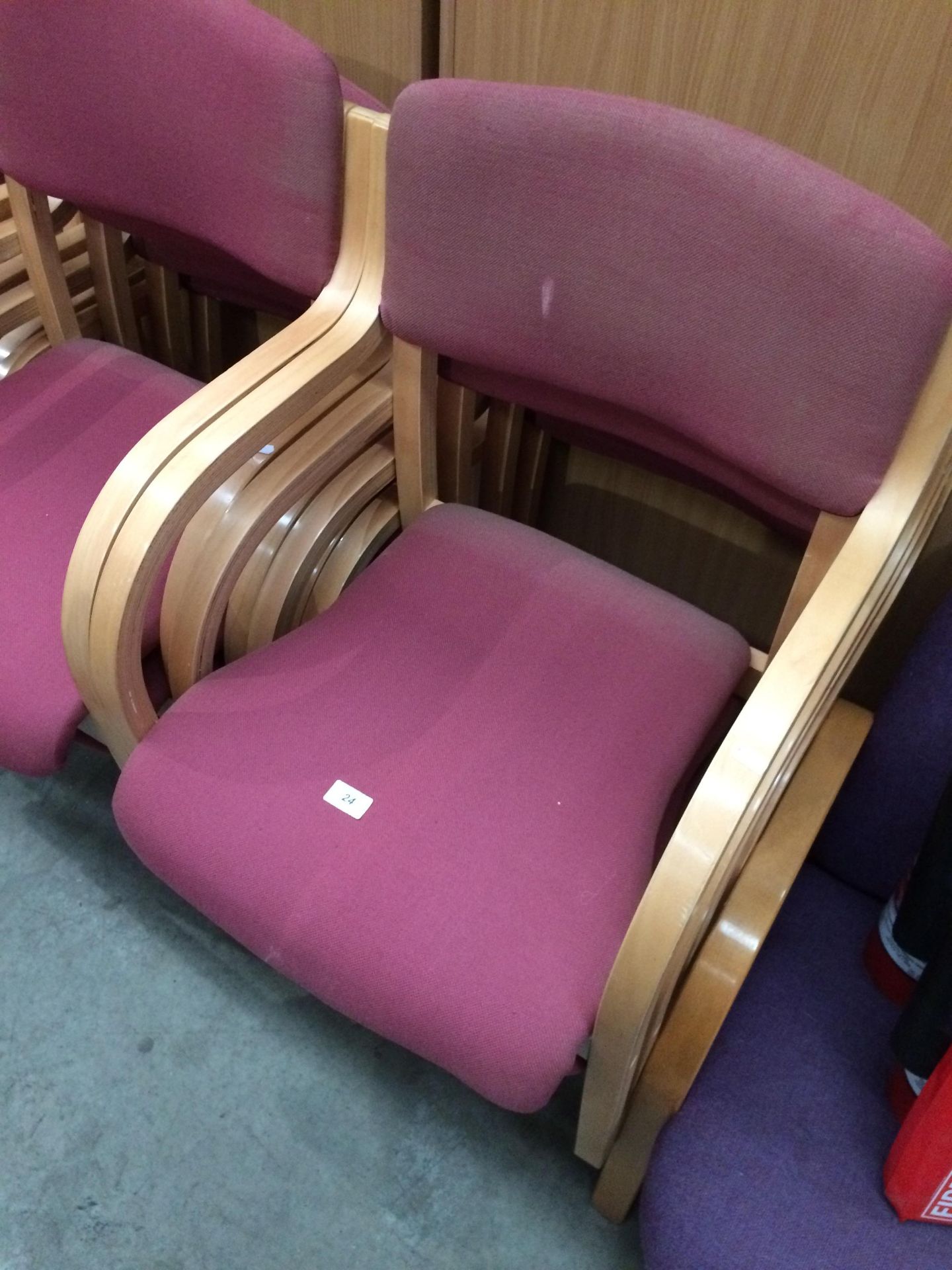 4 x red upholstered reception chairs on light wooden frames