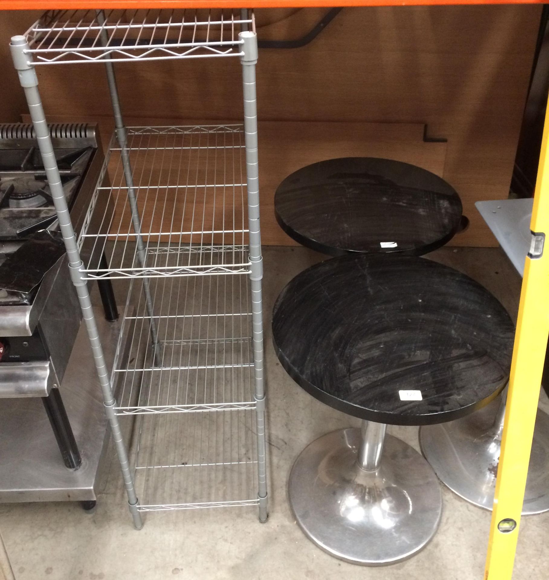 3 x black wooden cafe tables on chrome bases and a four shelf display rack