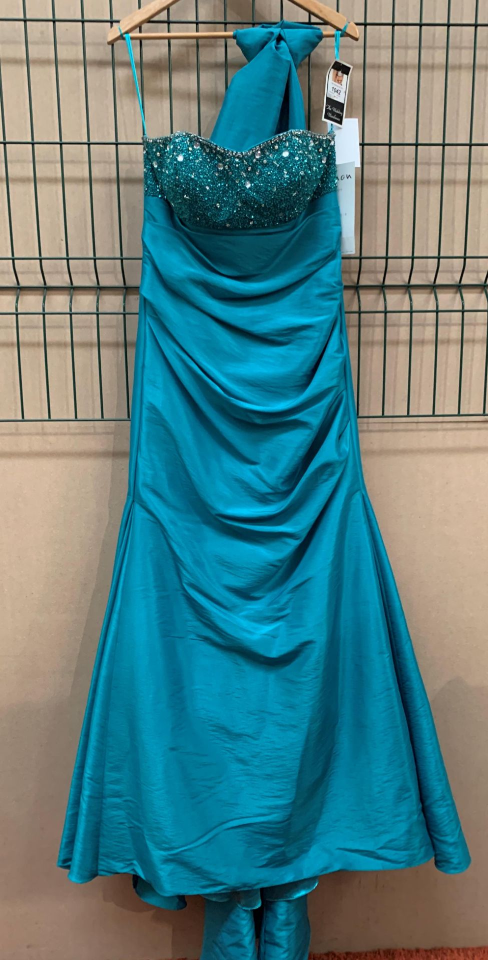 A bridesmaid/prom dress and stole by Man