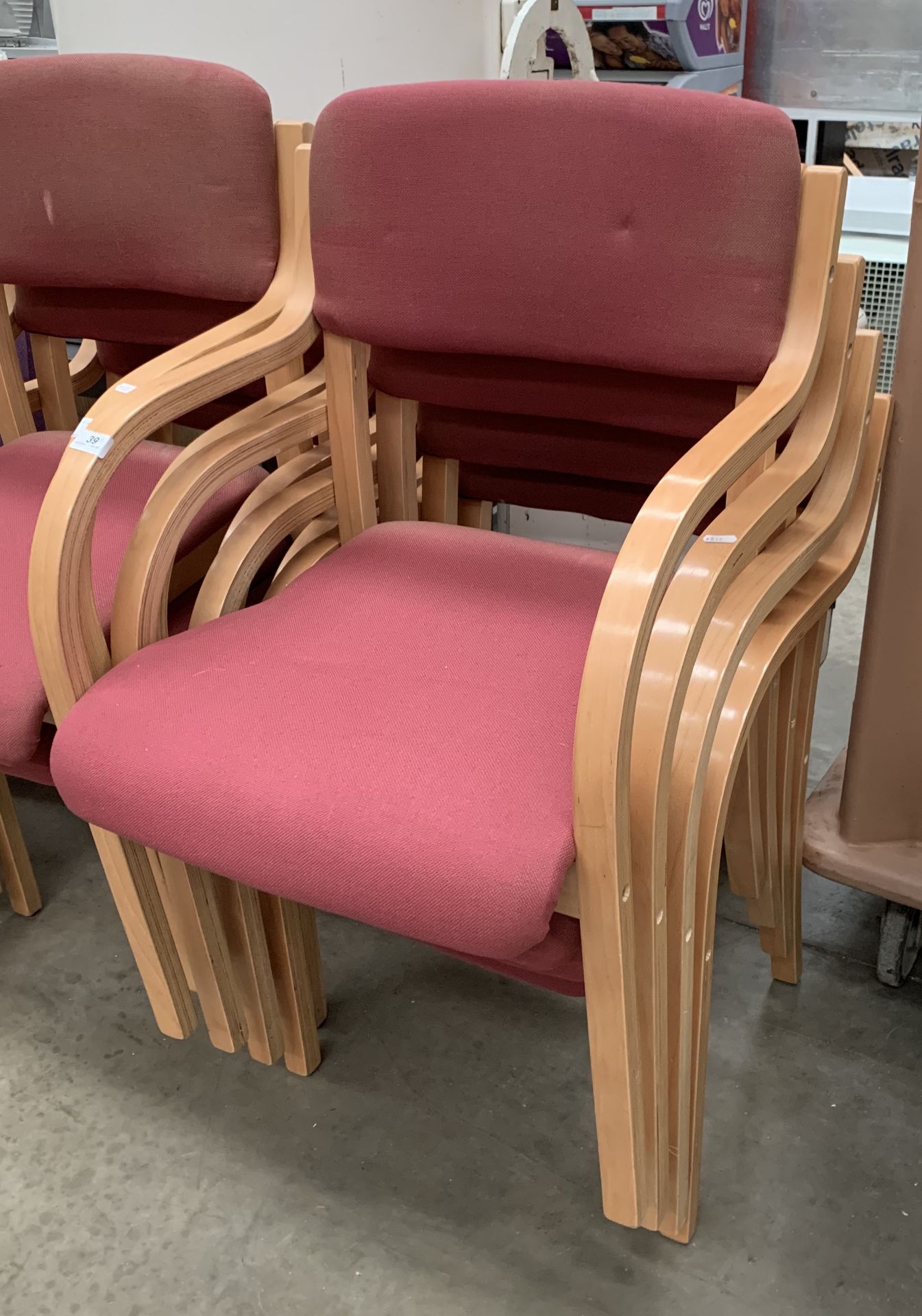 4 x red upholstered reception chairs on