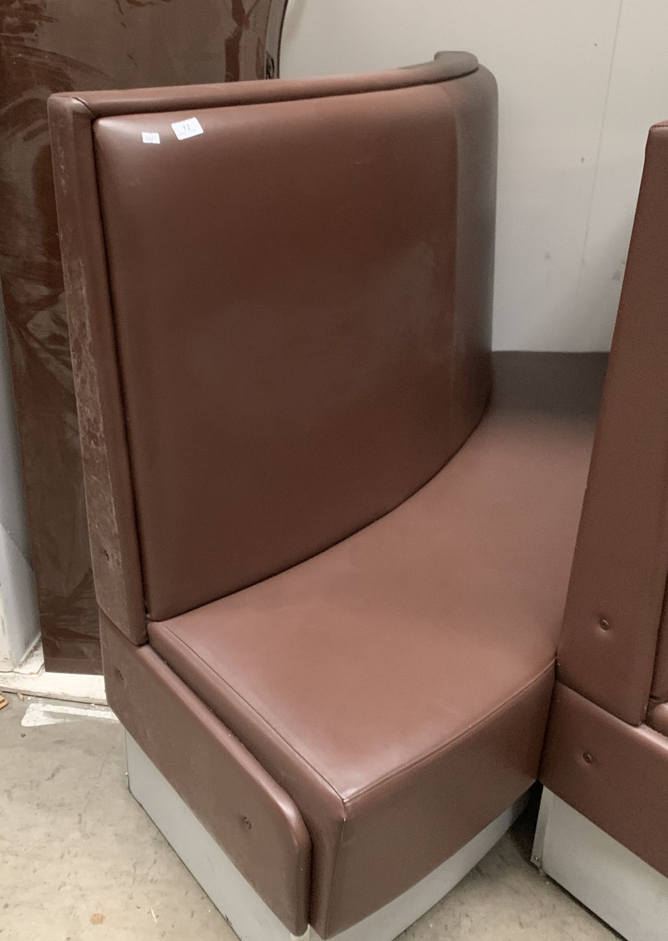 Chocolate brown vinyl upholstered curved