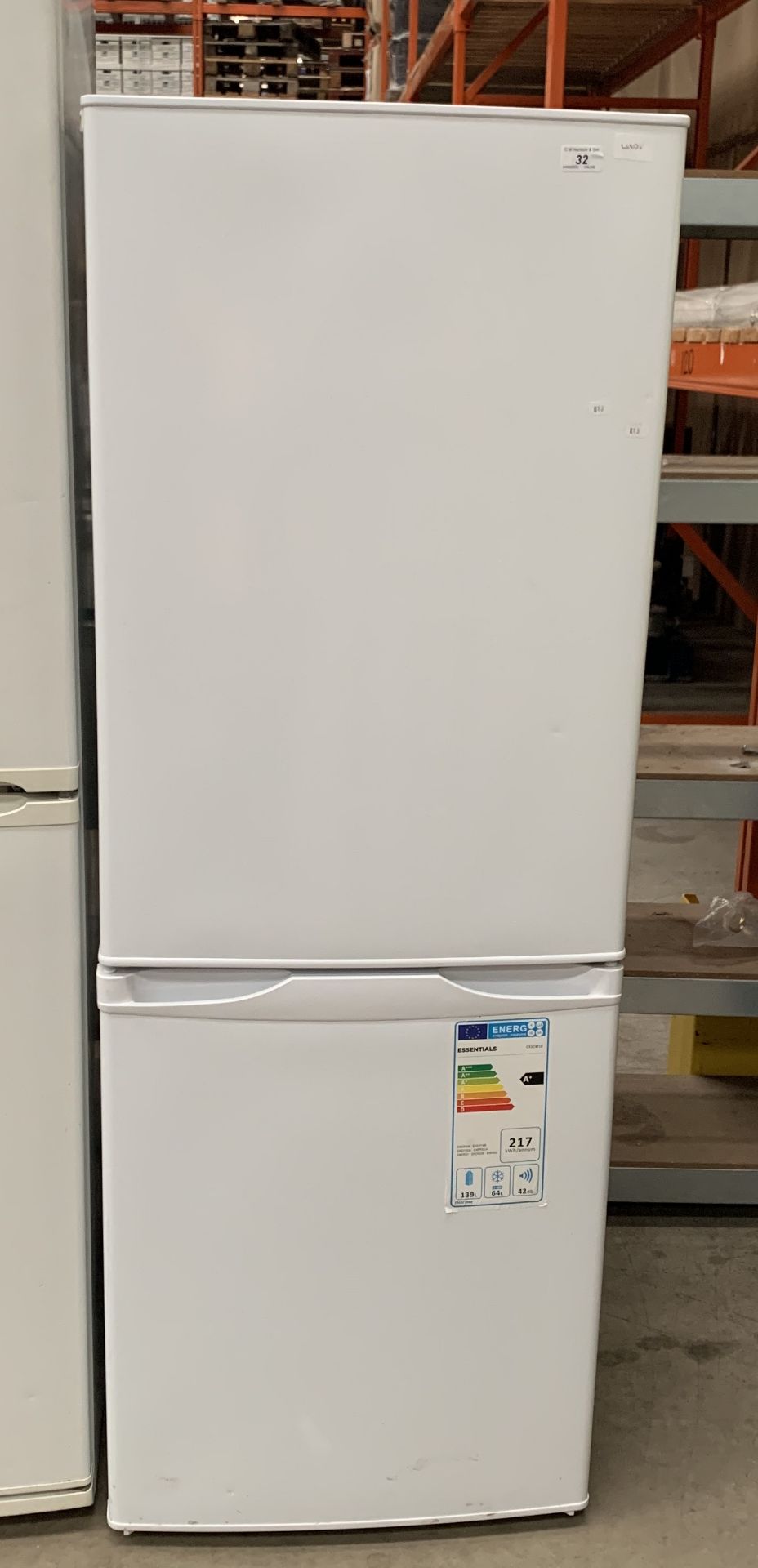 An Essentials C55CW18 A+ upright fridge