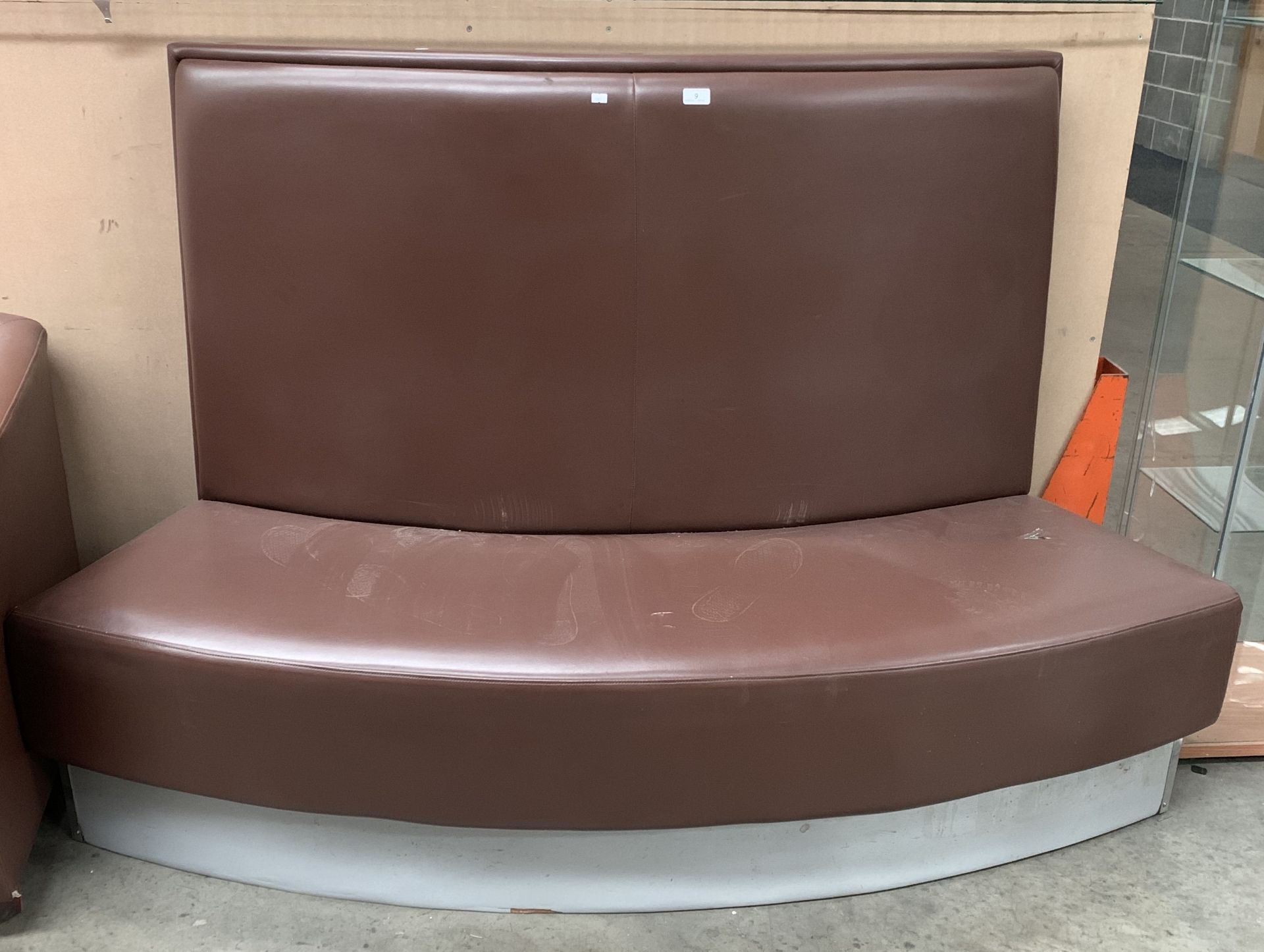 Chocolate brown vinyl upholstered curved