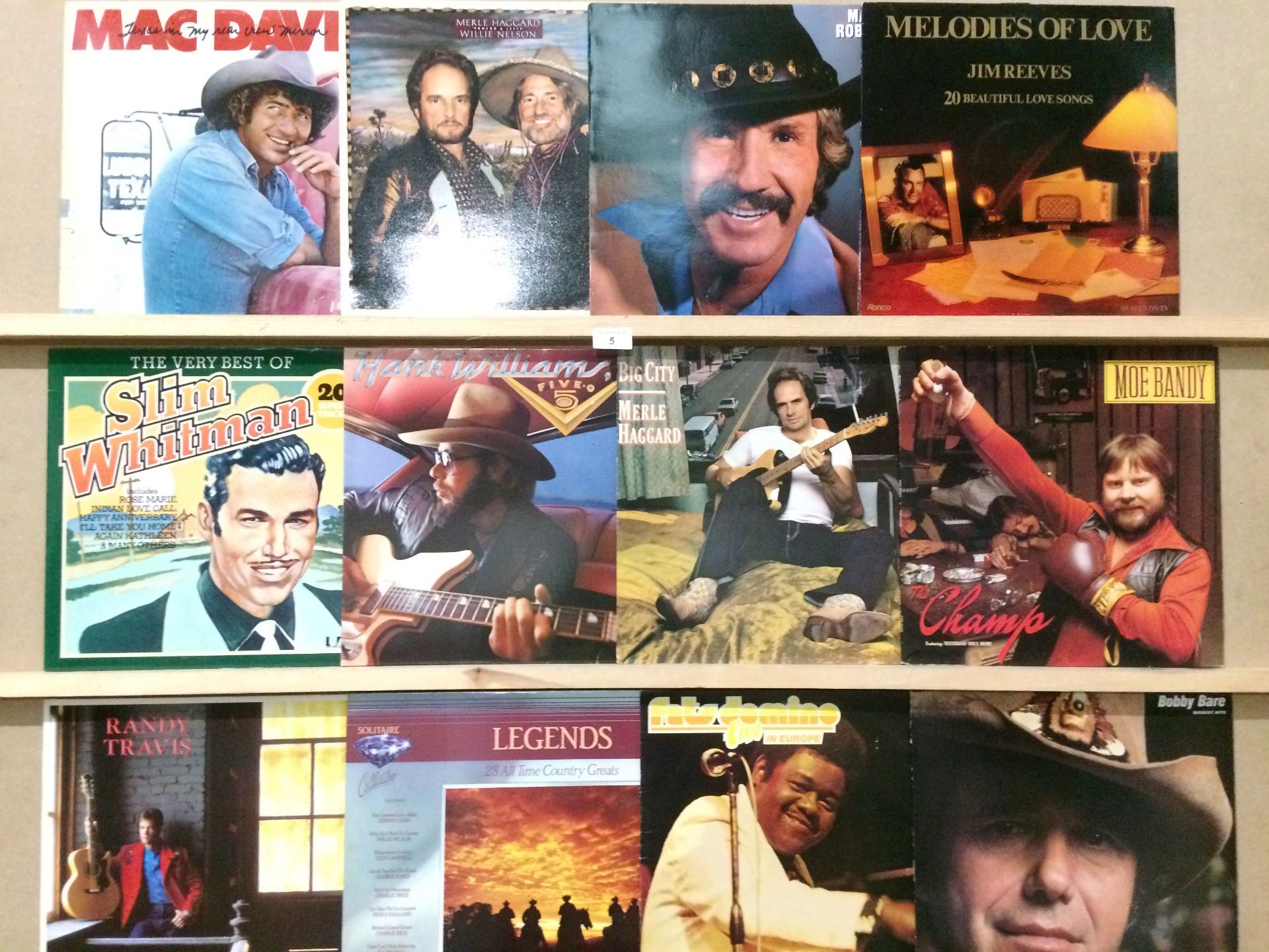 Contents to box approximately 55 LP's - mainly country - Merle Haggard, Slim Whitman, Randy Travis,