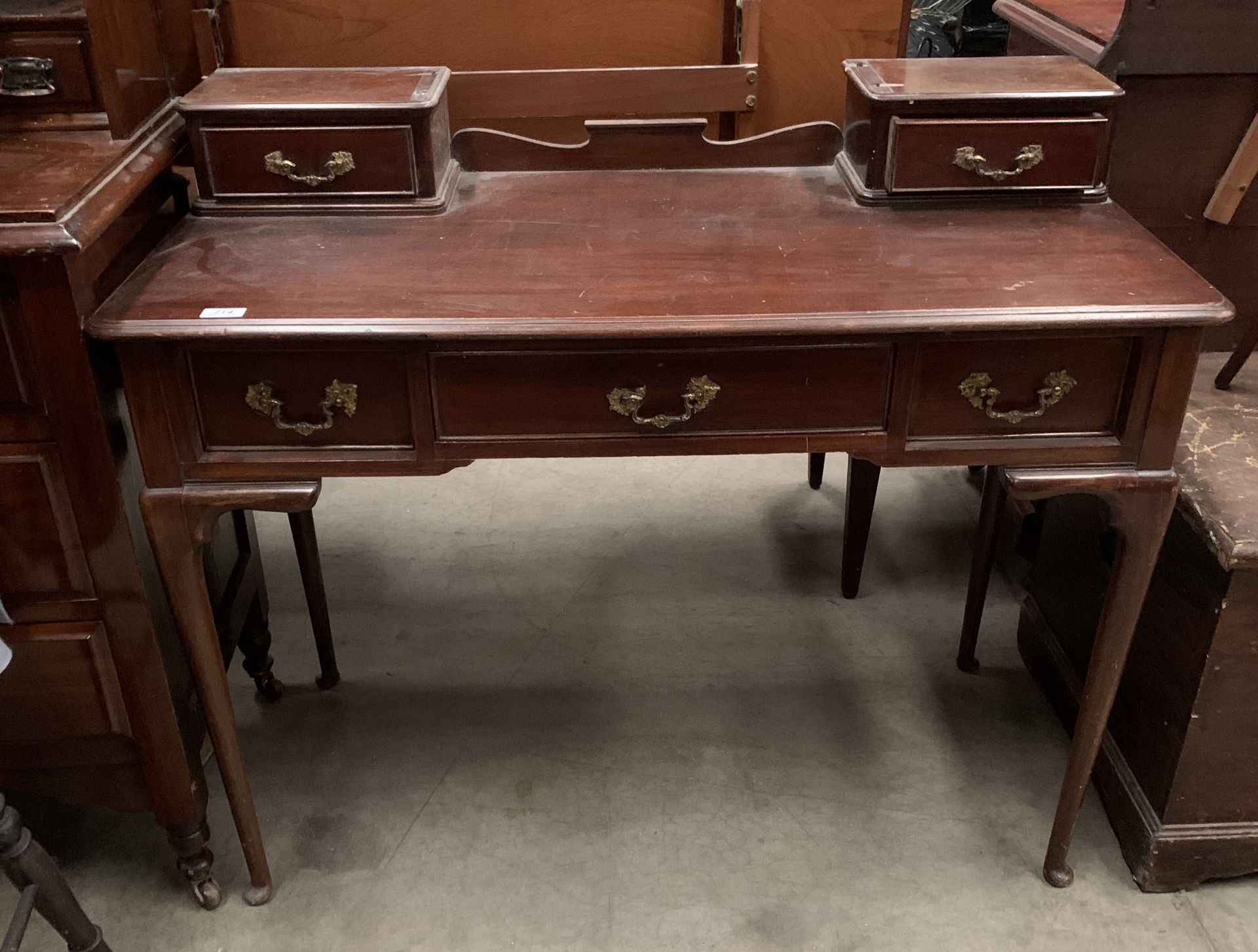 A mahogany dressing table - no mirror back section 104cm long