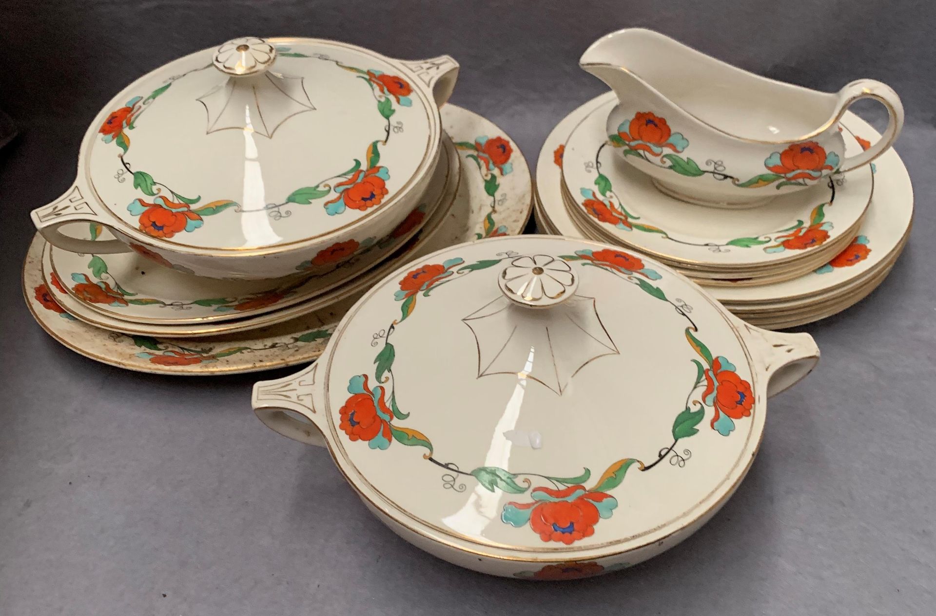 Fifteen pieces of Scotch Ivory dinner service including two tureens with covers