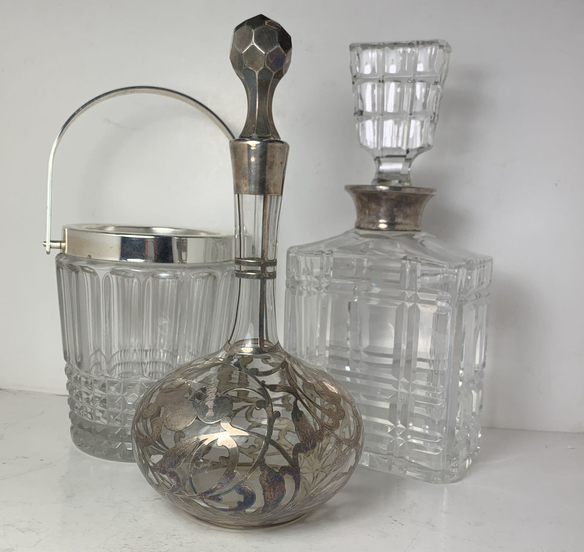 Decanter with silver mount and glass stopper,