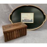 A wooden box in the form of books together with a tray