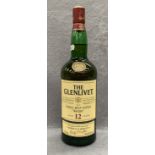 A 1 litre bottle of The Glenlivet Single Malt Scotch Whisky,