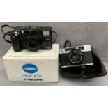 A Prinz Saturn 35 auto camera and a Minolta AF-Tele Super camera (boxed)