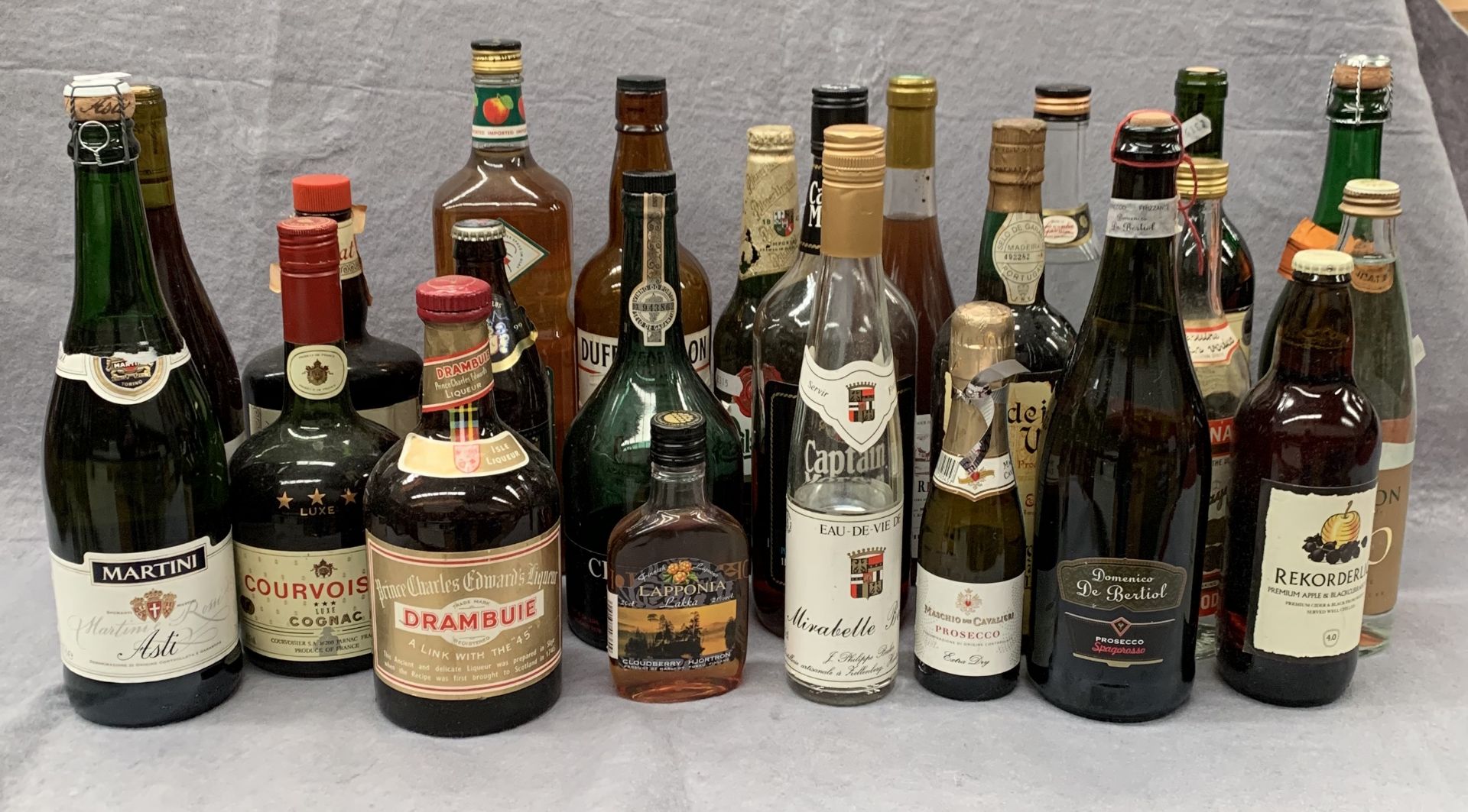 23 full and part bottles of wines, spirits,