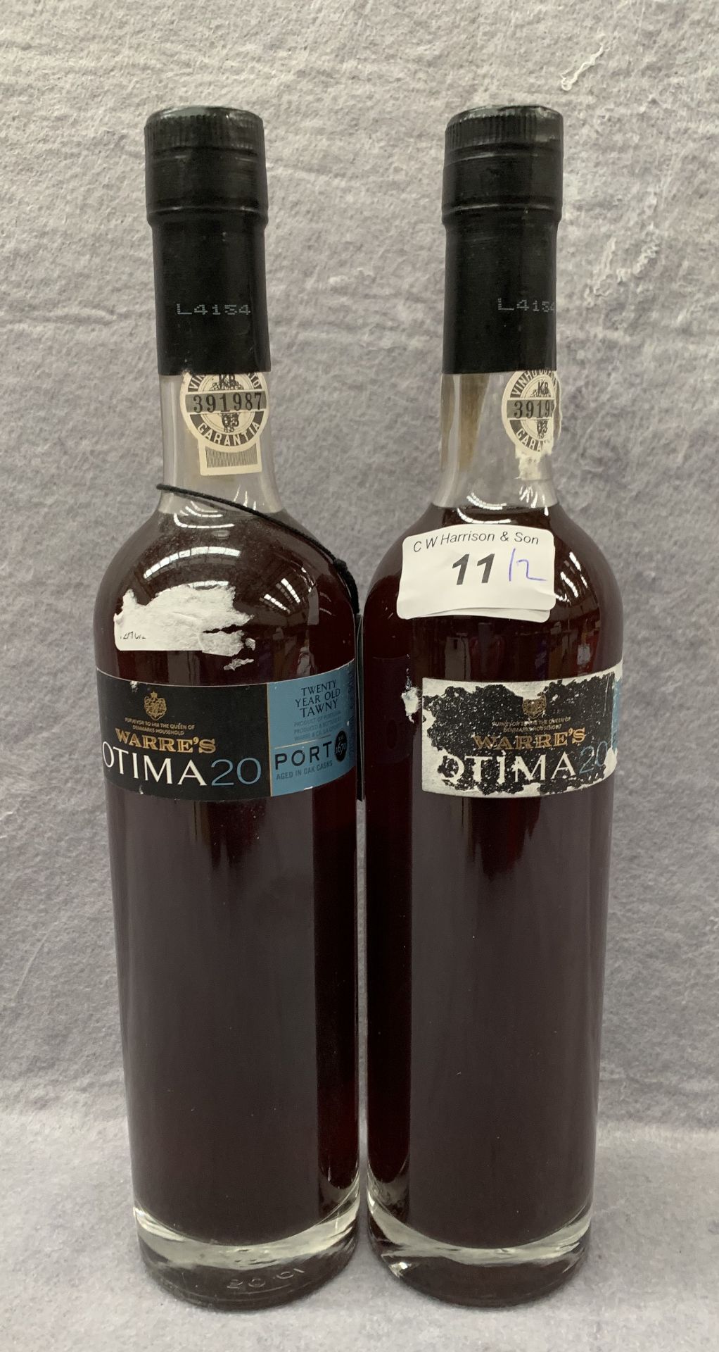 Two 50cl bottles of Warre's Optima 20 oak cash aged twenty year old tawny port