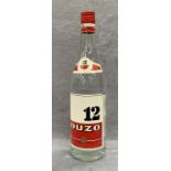 A 1 litre bottle of Ouzo 12