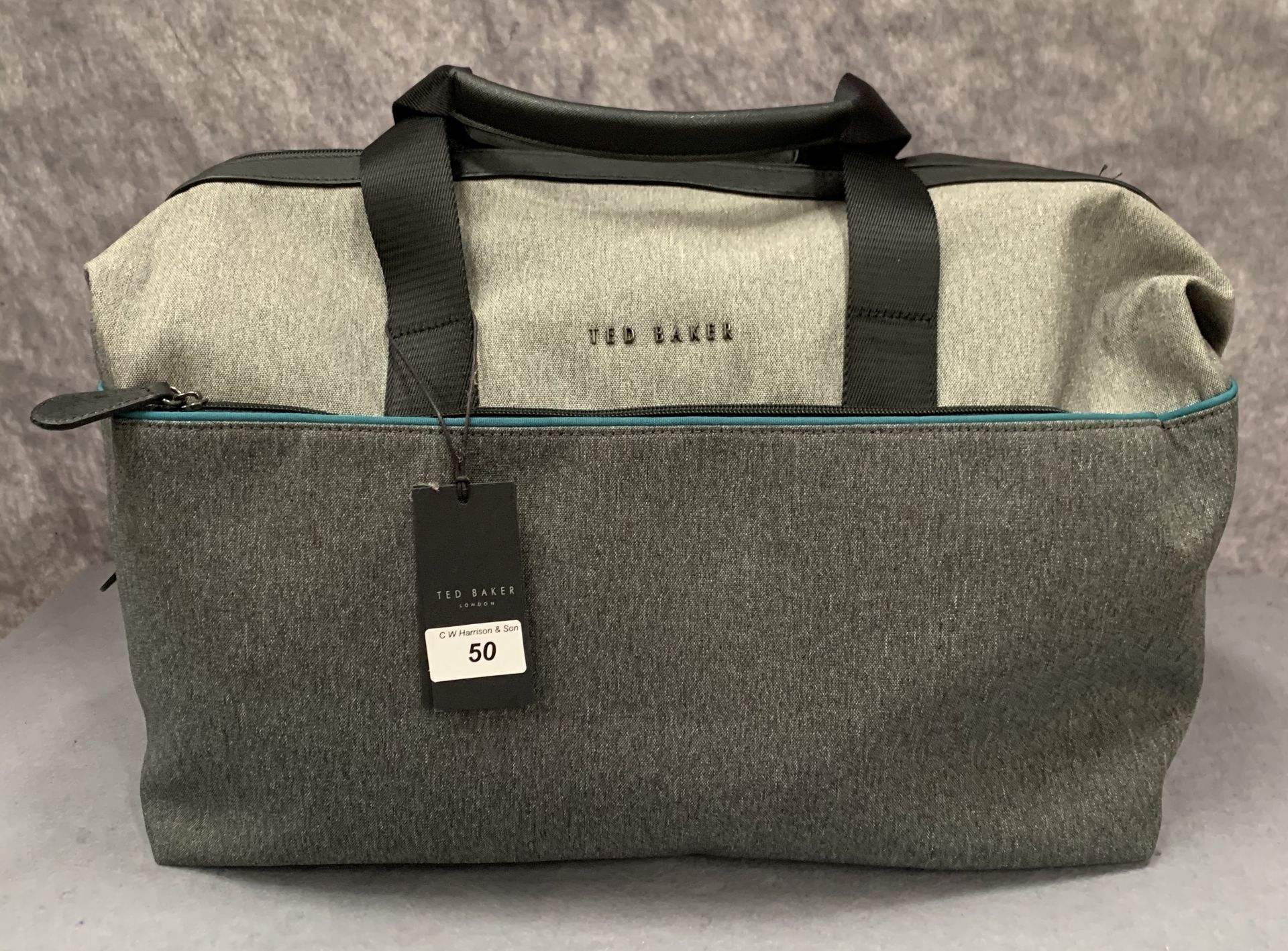 A Ted Baker London grey nylon holdall,