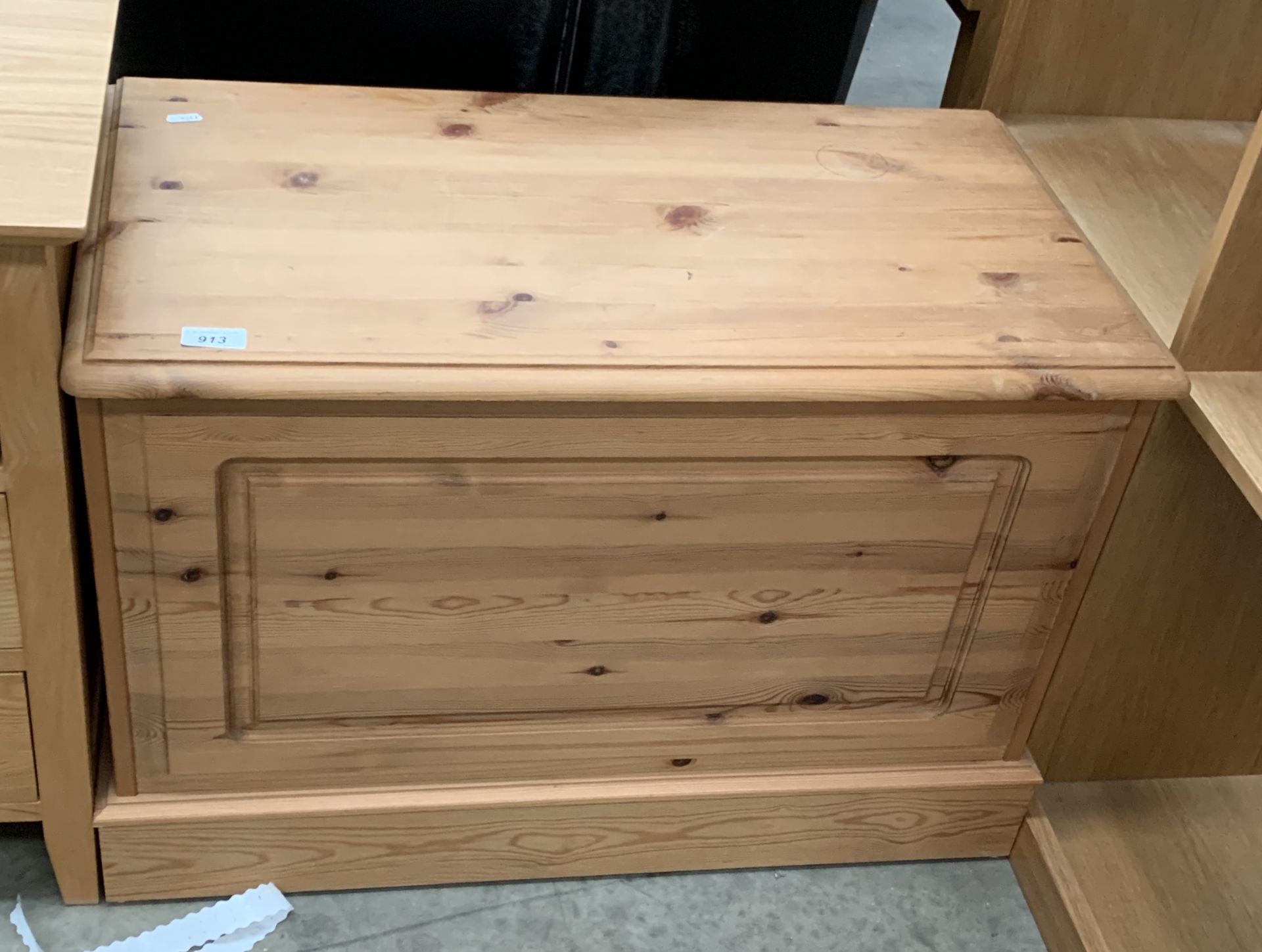 A pine lift top blanket box,