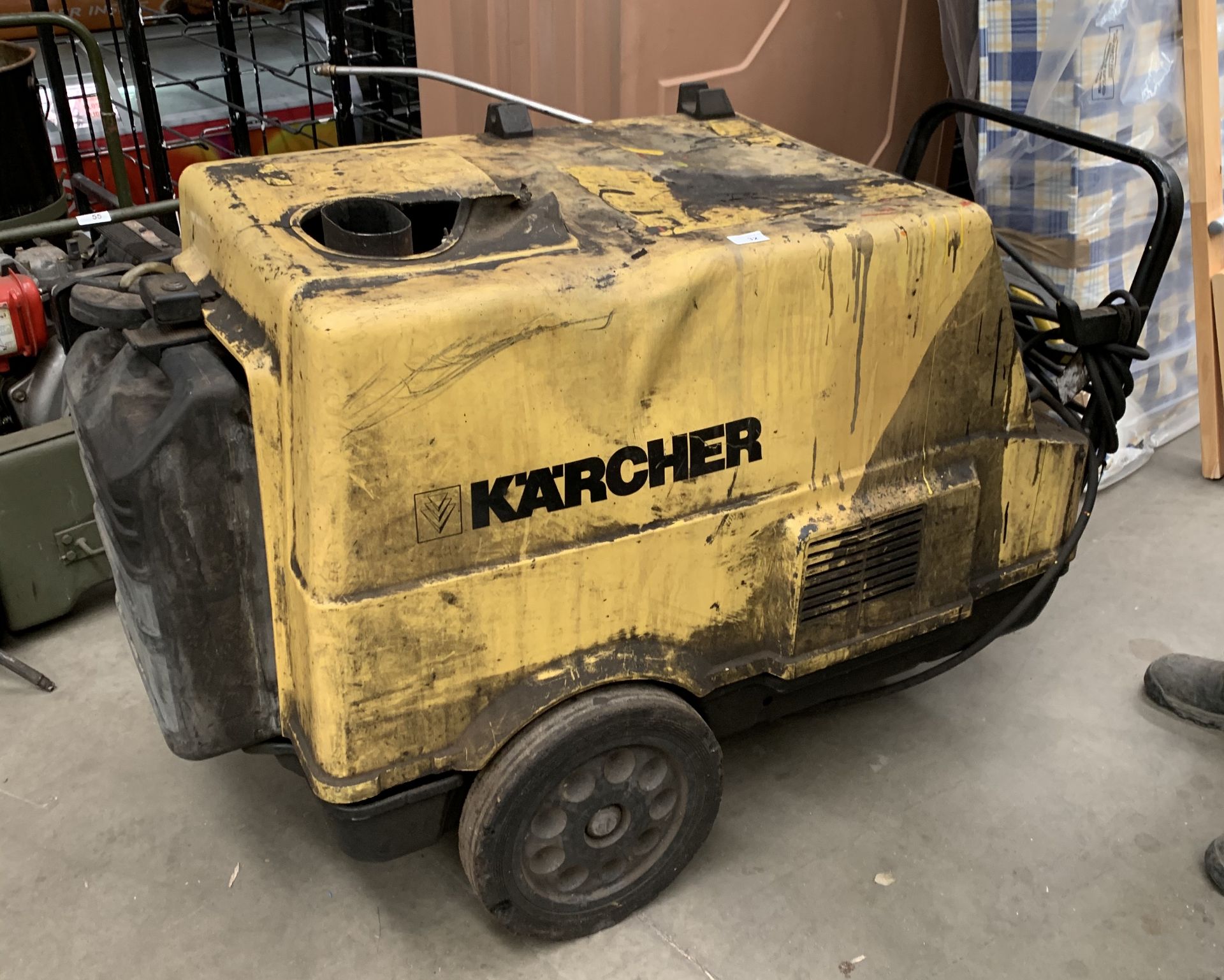 A K'a'rcher petrol pressure washer complete with lance Please note: If you require a forklift to