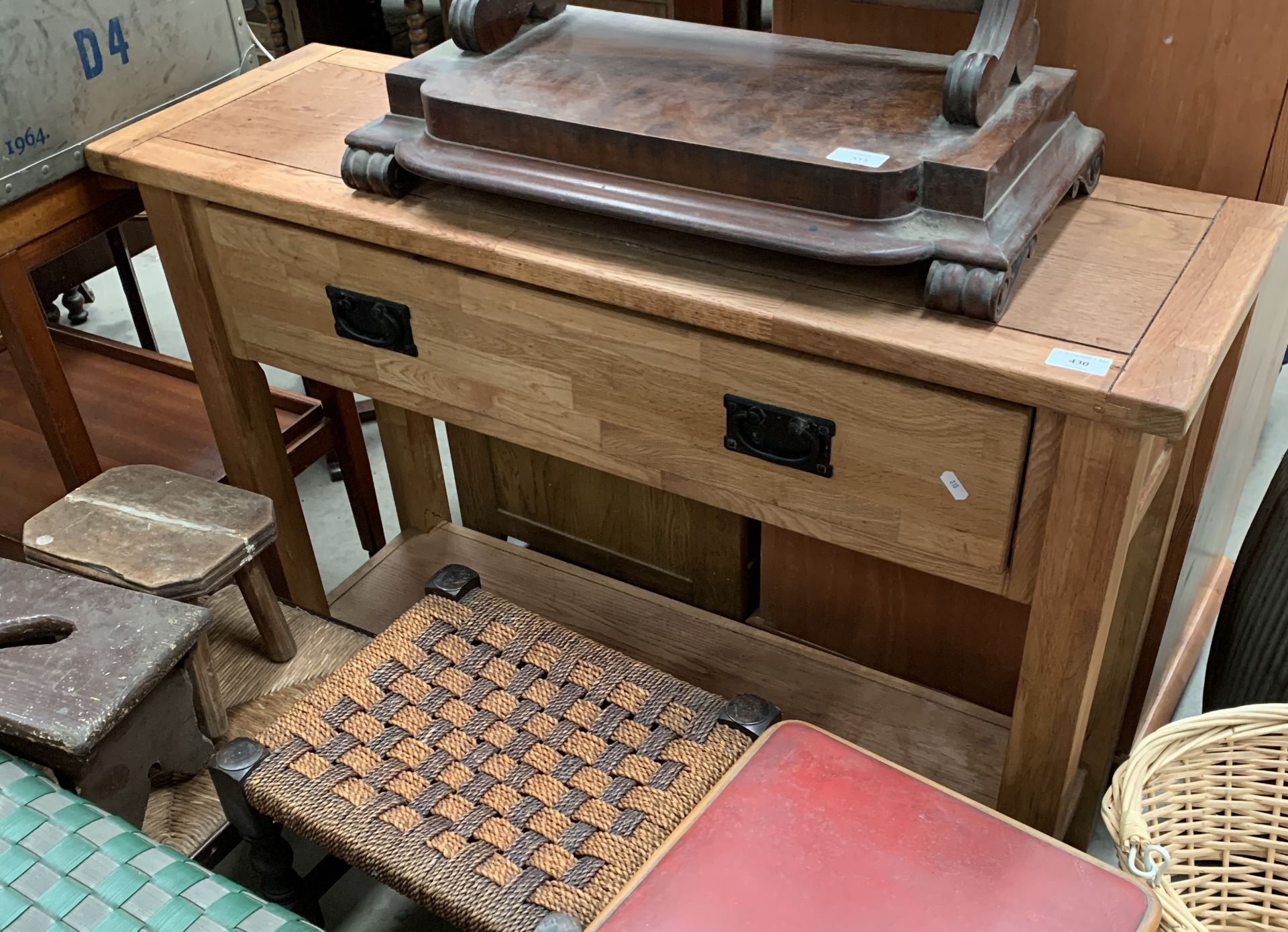 A light oak two drawer side table with undertray,