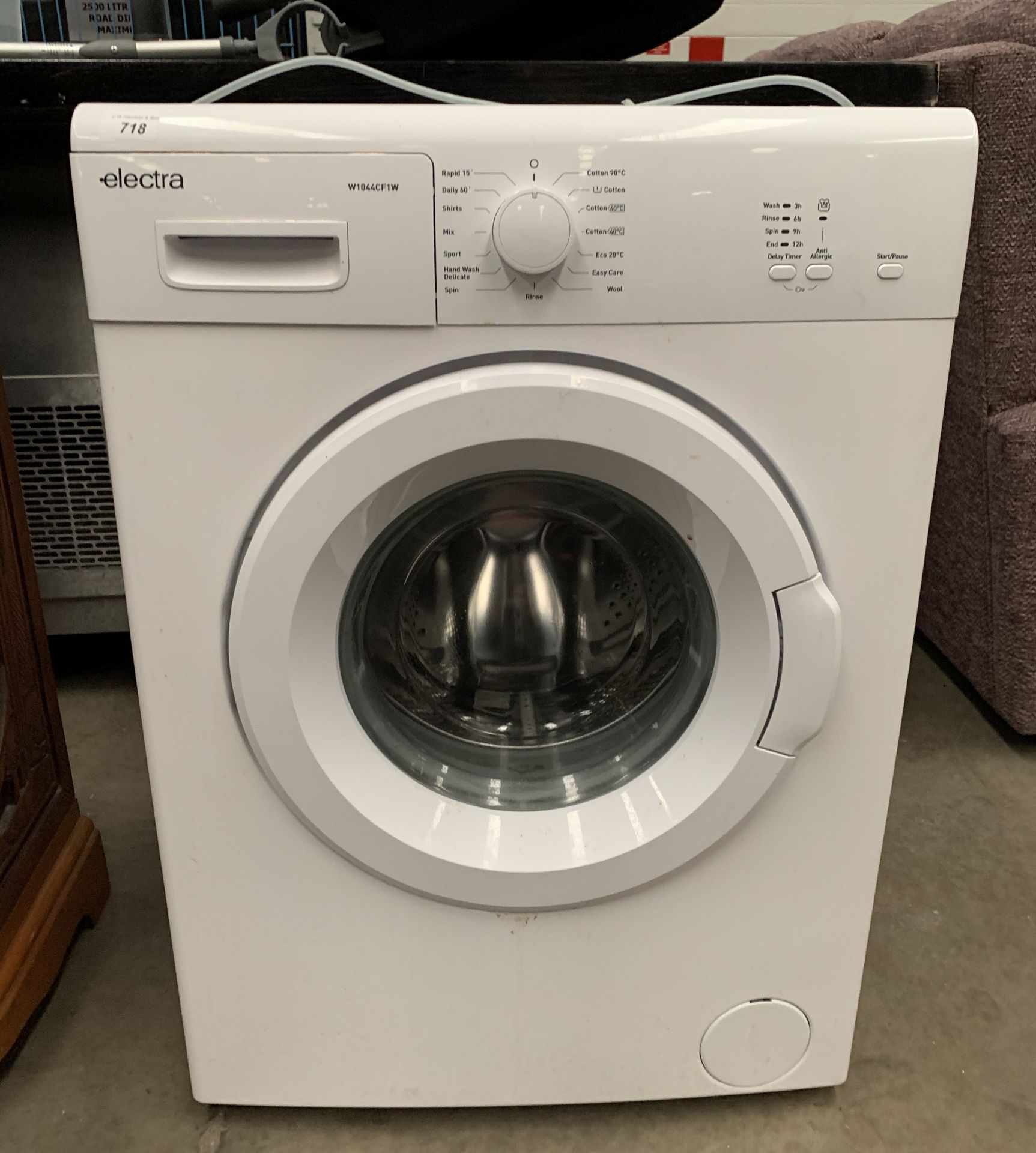An Electra W1044CF1W automatic washing machine