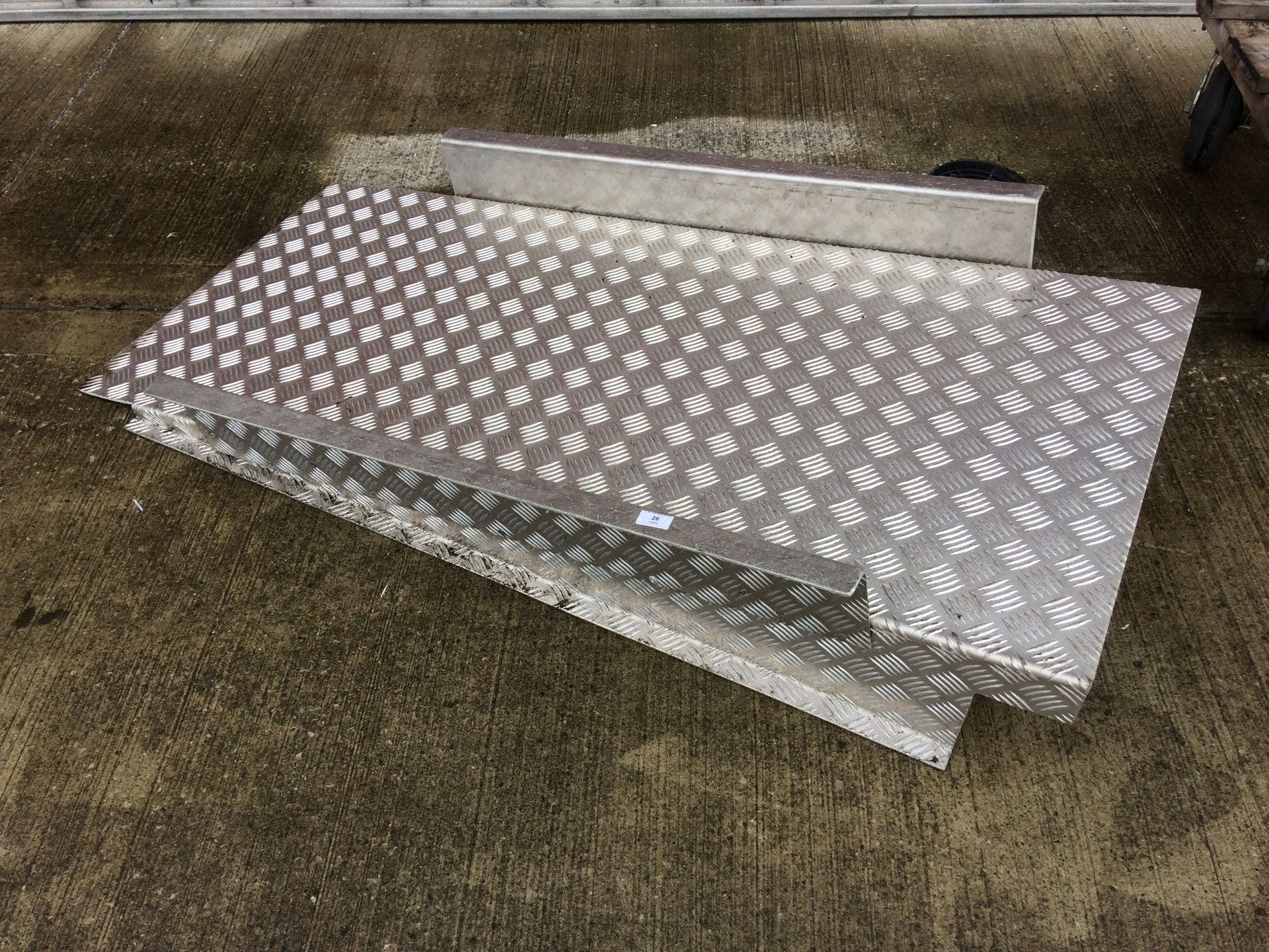 A small galvanised chequer board loading ramp - 150 x 66cm wide