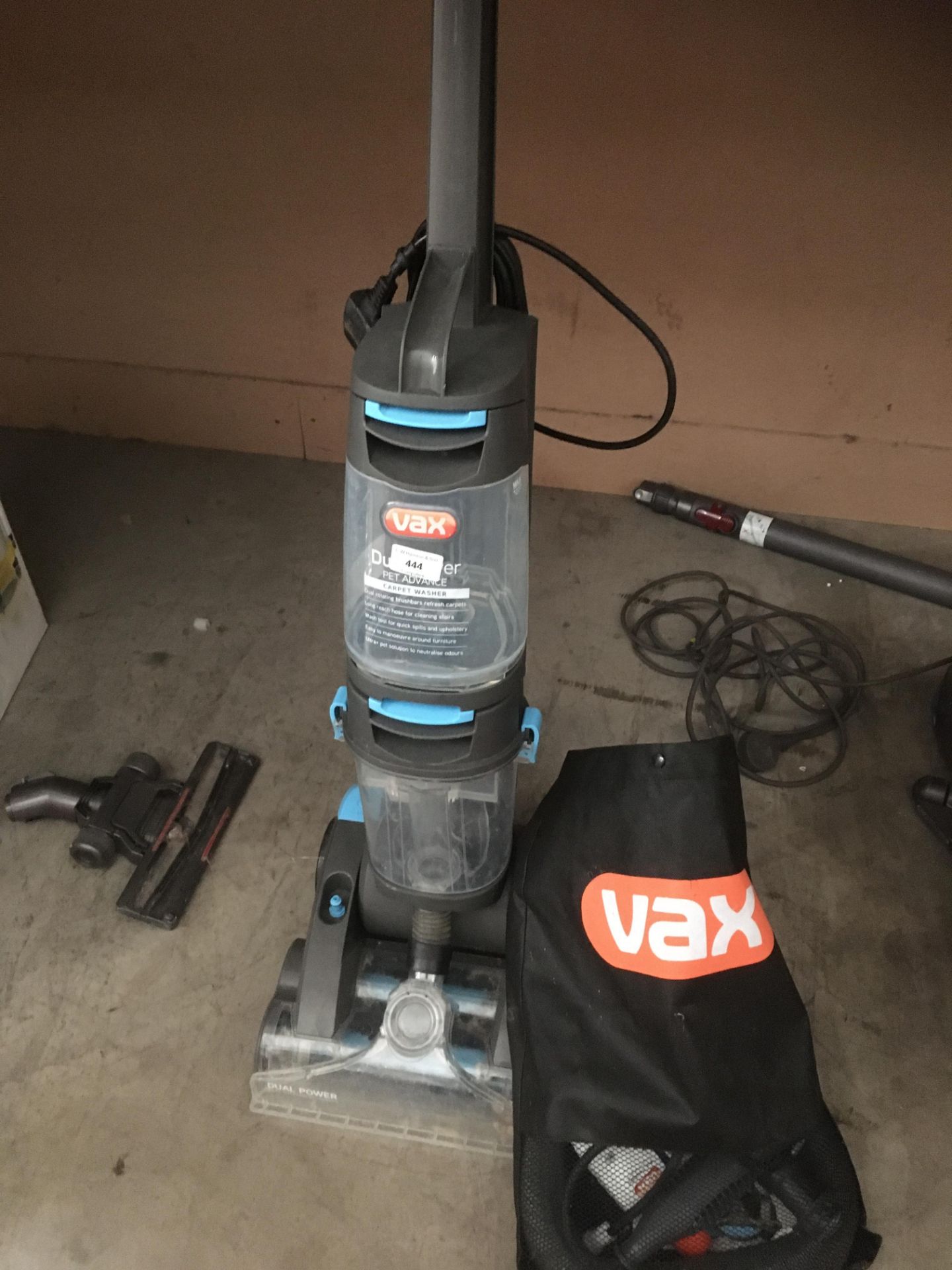 Vax Dual Power vacuum cleaner and bag of attachments