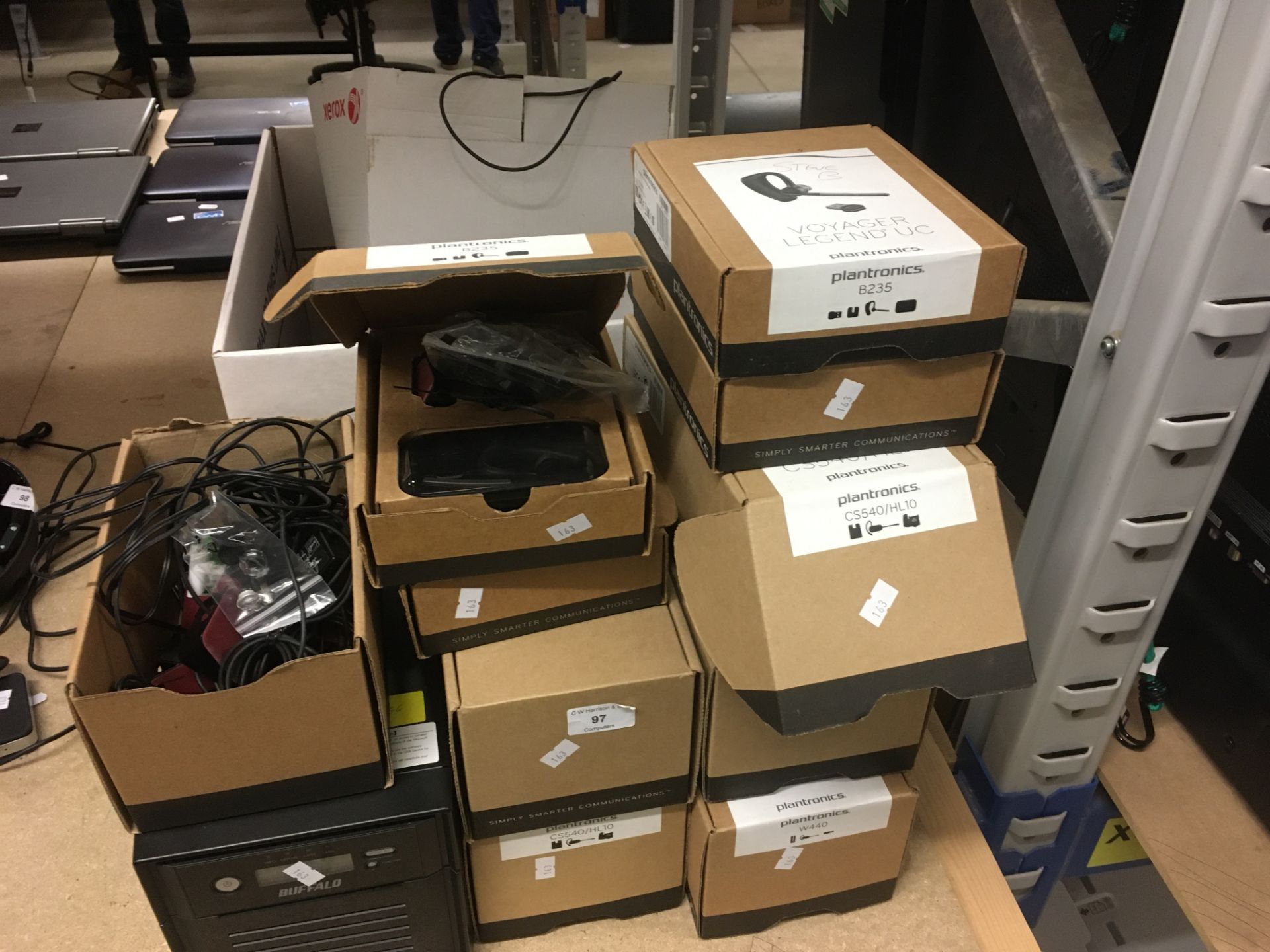 Approximately 50 x Plantronics B235 Voyager bluetooth headsets and a Buffalo terastation server