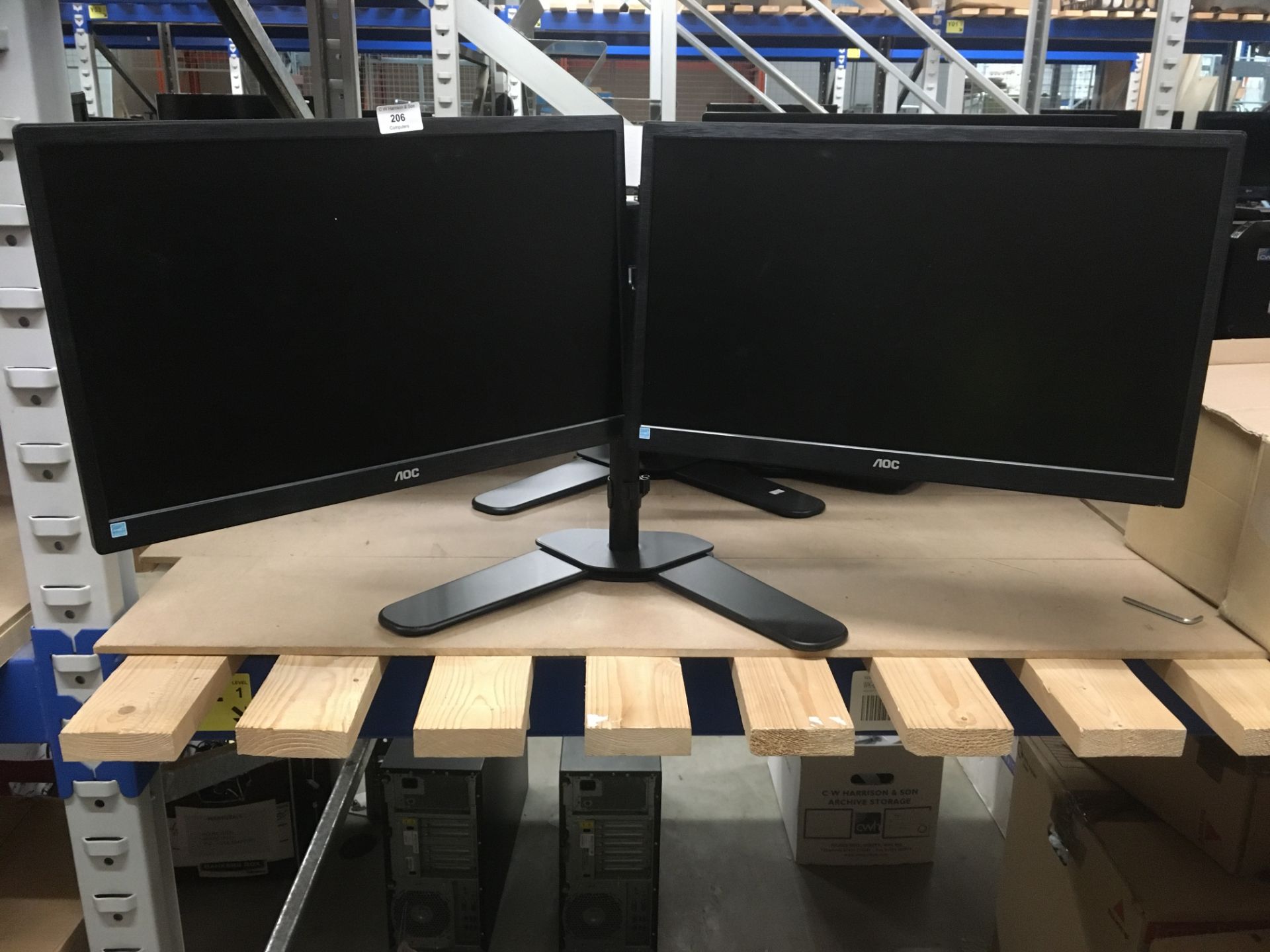 2 x NOC E2270SW 22" LCD monitors complete with a twin arm monitor bracket with stand