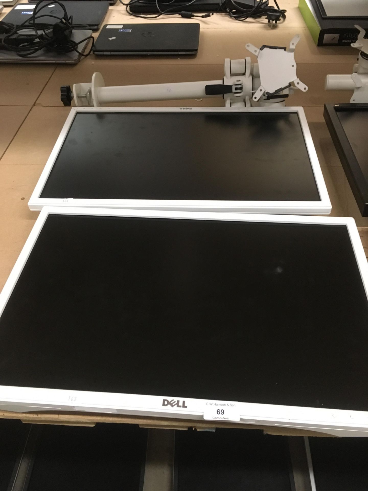 2 x Dell P2217WH 22" LCD monitors and a twin pole mounted monitor arm by Kardo