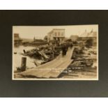 An album of twenty four photographic prints depicting Nome,