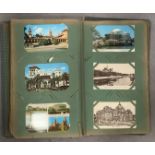 An album containing 199 assorted topographical postcards - mainly GB and Europe