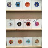 Twelve 45rpm singles, The Olympics, Derek Martin, Ila Van, Creative Source, the Charades,