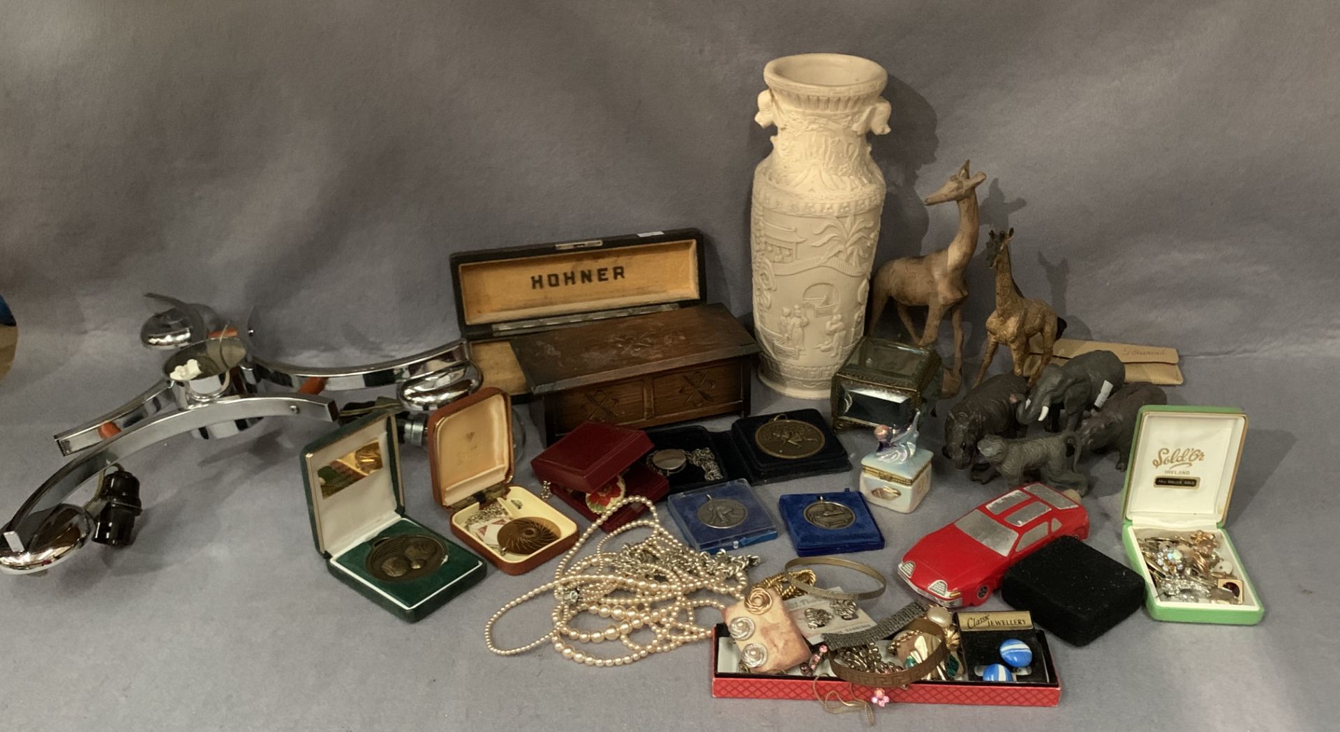 Contents to wood tray - oriental style vase, music box, plastic and wood animals, costume jewellery,