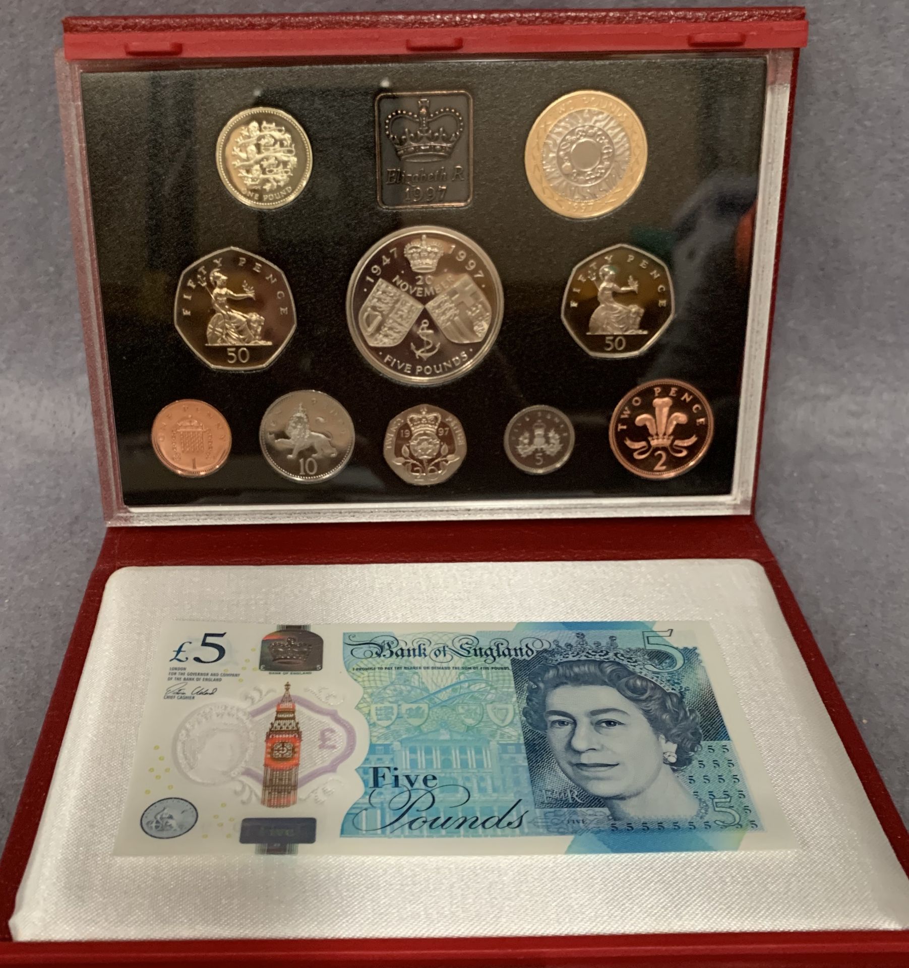 A 1997 UK cased proof coin collection produced by the Royal Mint complete with certificate of - Image 2 of 2