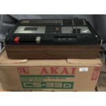 An Akai ES-33D cassette stereo tape deck complete with box