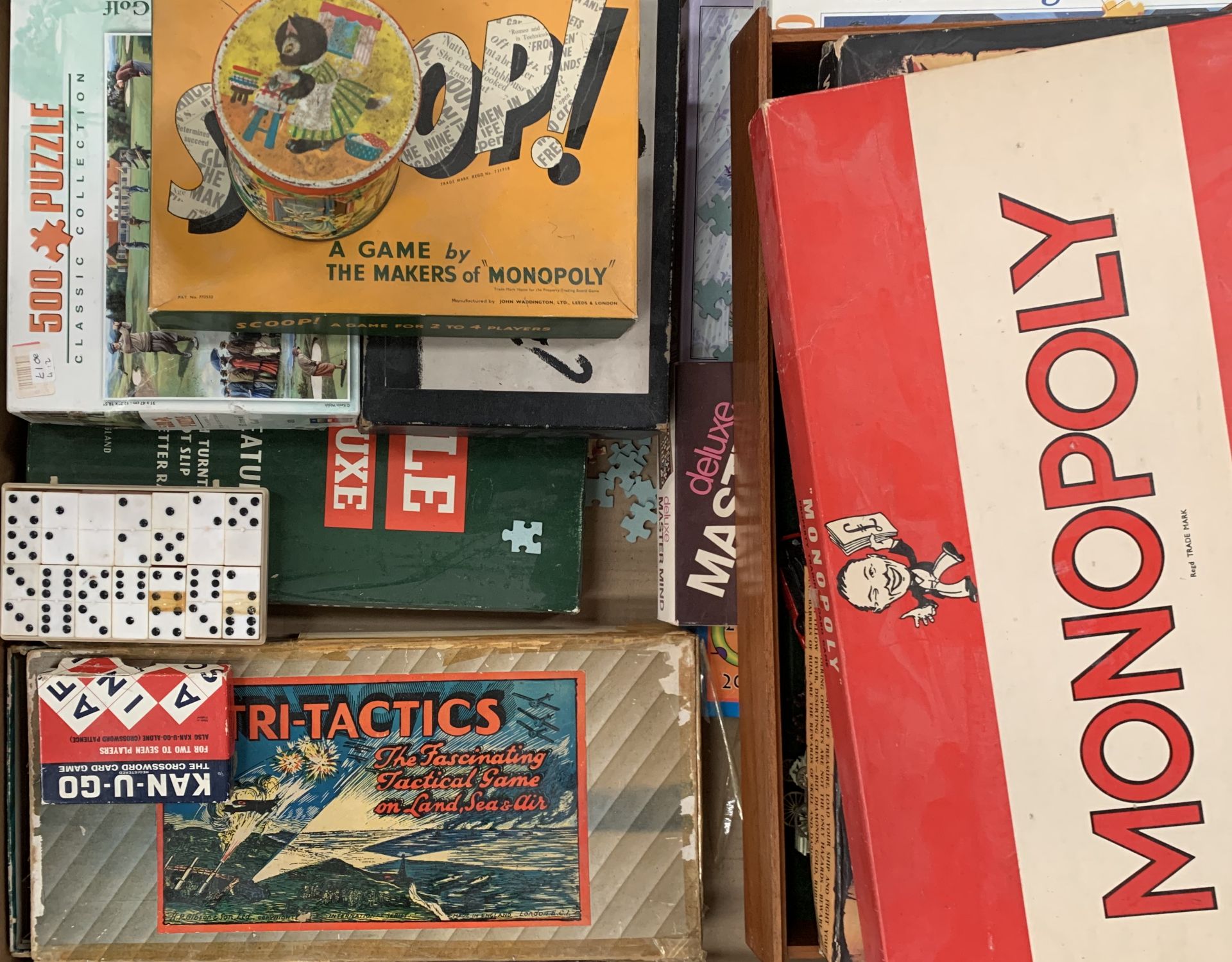 Contents to tray - various games and puzzles, Monopoly, Scoop, Tri-Tactics, Buccaneer, etc.