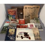 An old leather briefcase and a quantity of old vehicle brochures, Hercules Cycles 1936,