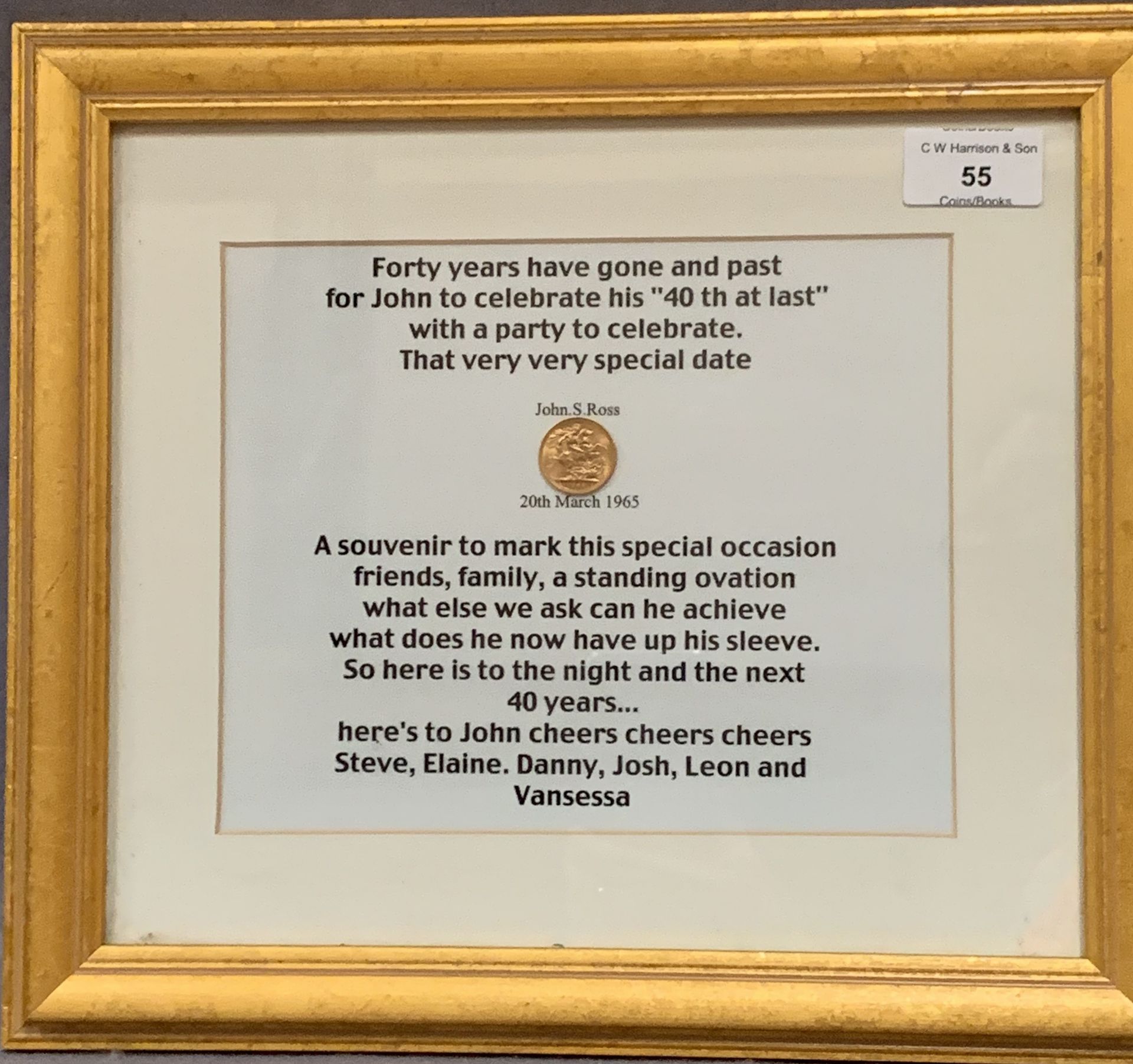 A 1965 gold sovereign mounted in a presentation frame