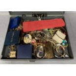Contents to plastic box file, a large quantity of assorted costume jewellery, watches, bangles,