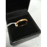 A 22ct gold wedding band total weight 4.