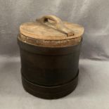 A small wooden barrel with lid 25cm high x 25cm diameter