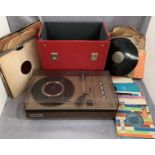 A Pye Cambridge 1557 stereo turntable and a red vinyl record case and contents,