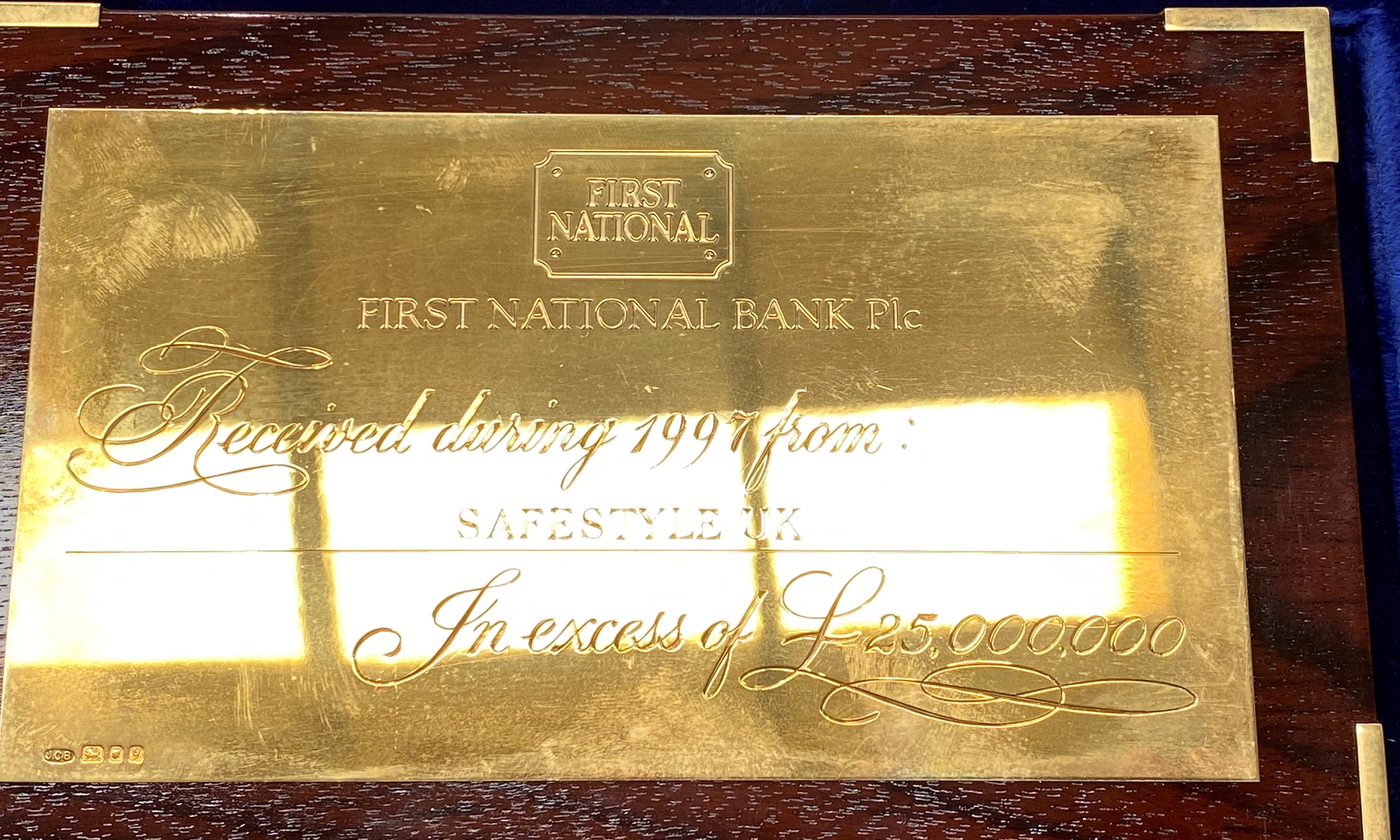 A silver presentation plaque from The First National Bank mounted on a walnut finish frame complete - Image 4 of 4