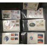 Seven vinyl files containing a large quantity of first day cover envelopes,